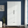 [White] Flutrina 2-door fluted wardrobe in a bedroom lifestyle setting showing full height and door detail