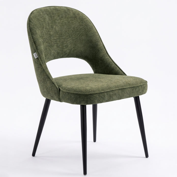 [Green | Set of 2]  Angled view of fabric dining chair with rounded open back, piped seat and four black legs.
