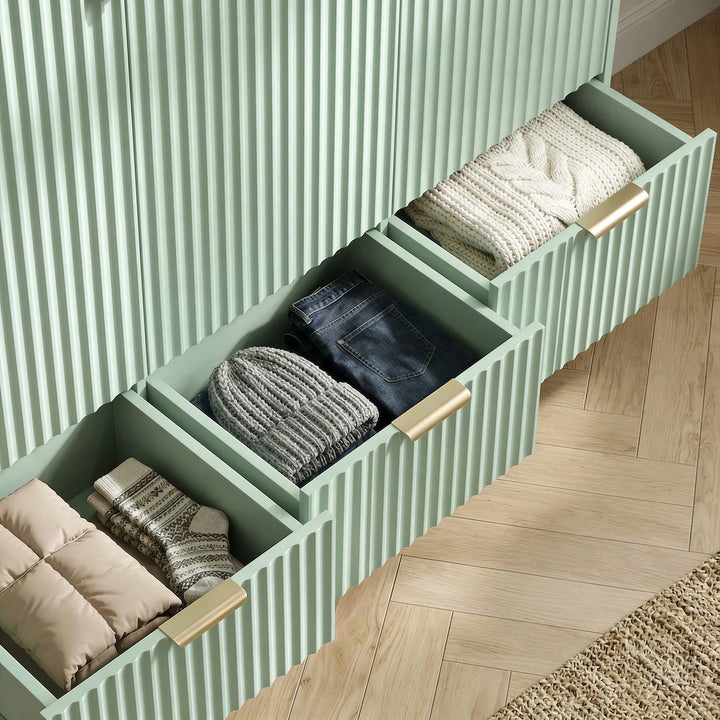 [Sage Green] wardrobe drawer storage extended to reveal the internal layout for clothing