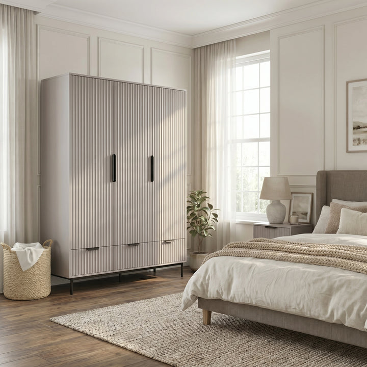 [Grey] three door wardrobe with drawers styled in modern room with neutral walls and lighting