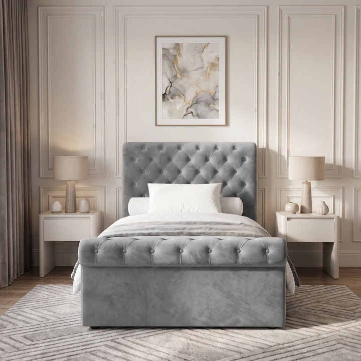 [Small Double | Grey] Front view of the Chesterfield Small Double Ottoman Storage Bed Grey Velvet showing the button-tufted footboard.