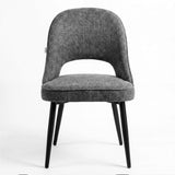 [Grey | Set of 2] Front view of the comfy fabric dining chair with rounded open back, padded piped seat and black metal legs.