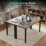 [120 X 50 cm] Computer Desk arranged in artist studio with sketches, paint tubes, brushes in jars, pencils, and laptop on a soft area rug