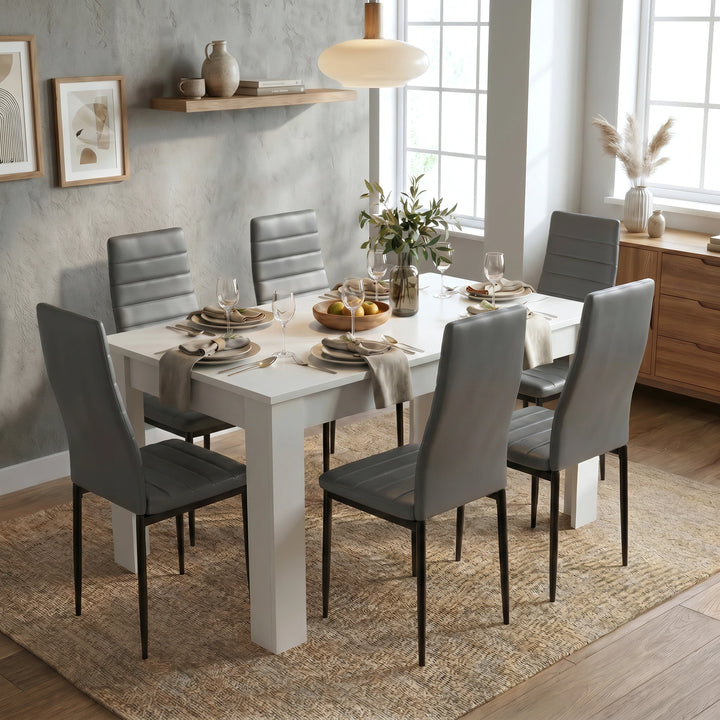 [6 Seater | Grey] Dining Table and Chairs Set with six grey faux leather chairs around a white rectangular table in a styled bright dining room