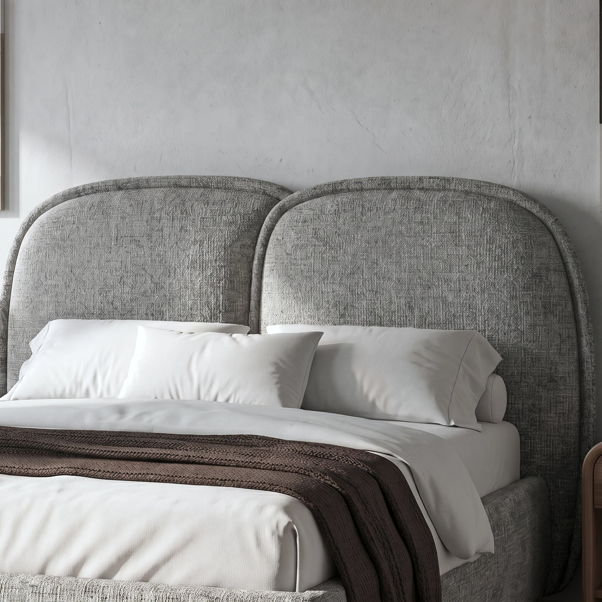 [Double | Grey] Embracea headboard close-up showing two arched upholstered panels in textured boucle fabric