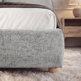 [Double | Grey] Embracea footboard detail showing boucle fabric texture and small natural rounded wooden feet