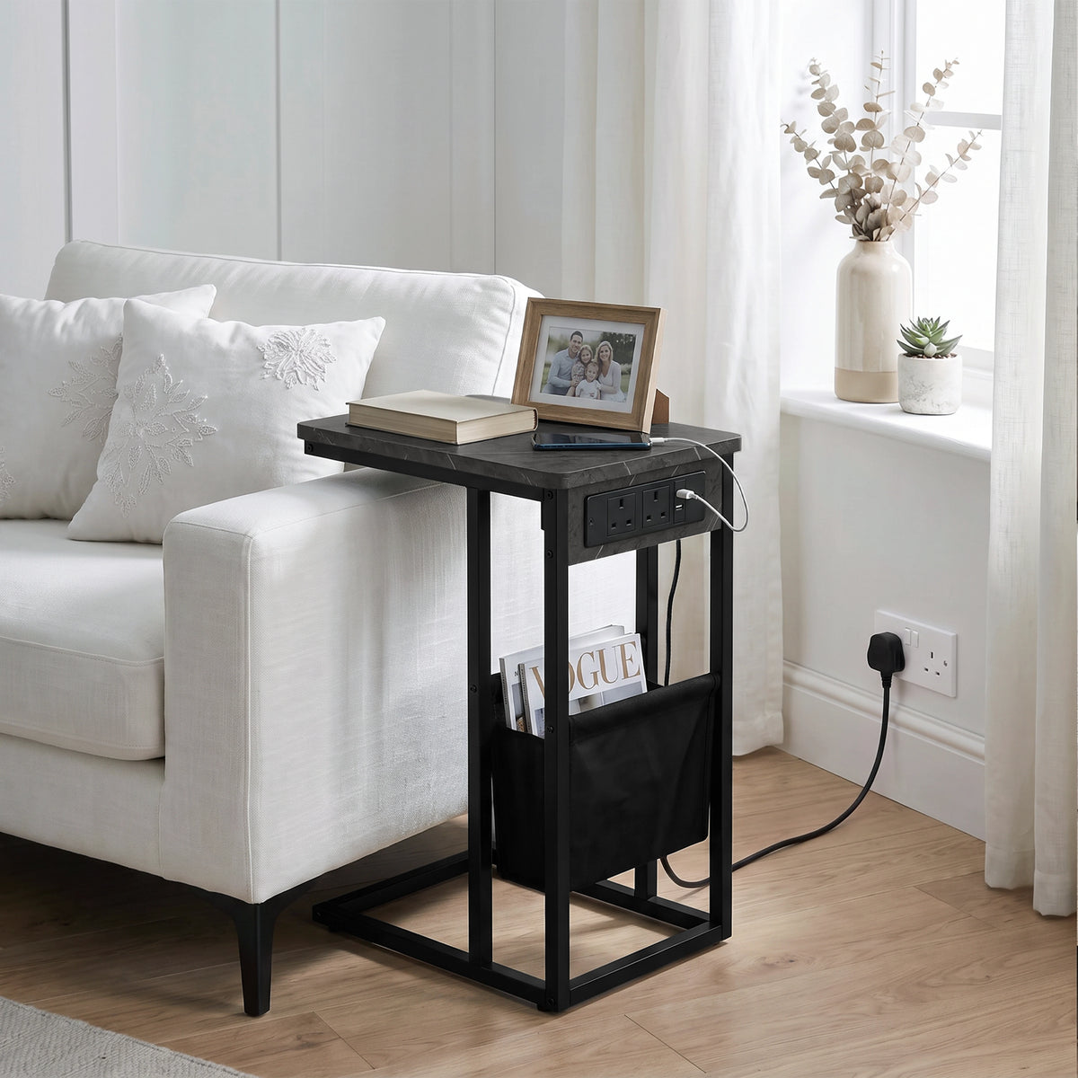 [Grey Marble] sofa side table side view with grey marble-effect top, socket panel, tea, power cable and storage pouch