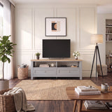 [Grey] Lifestyle living room setting with the Oskara Grey Painted TV Unit supporting a television up to 55 inches.