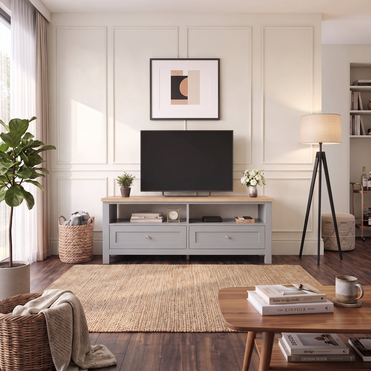 [Grey] Lifestyle living room setting with the Oskara Grey Painted TV Unit supporting a television up to 55 inches.