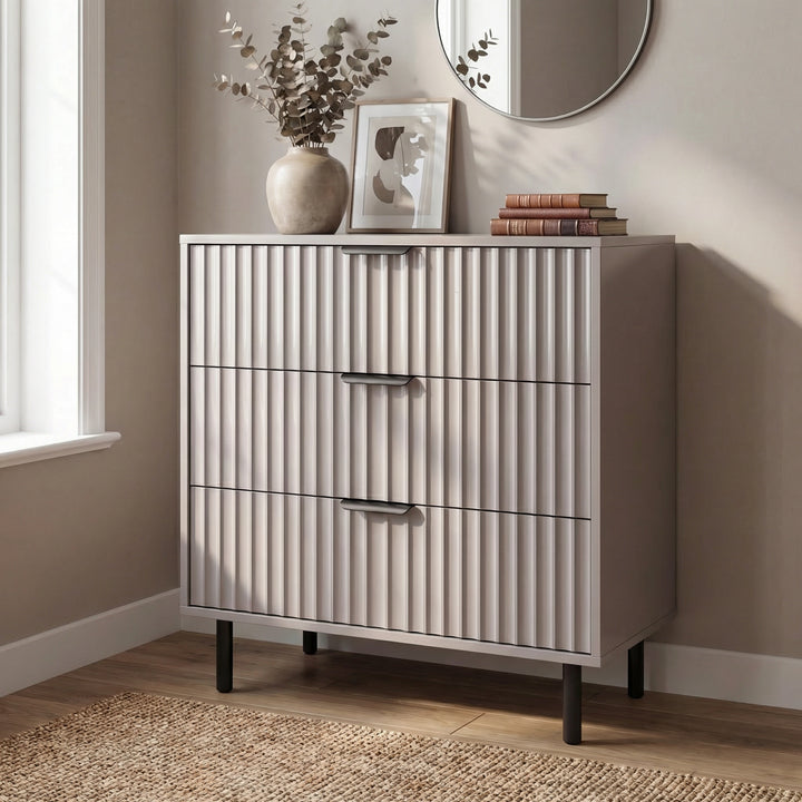 [Grey] Front perspective of grey bedroom three chest of drawers with structured flutrina pattern detailing