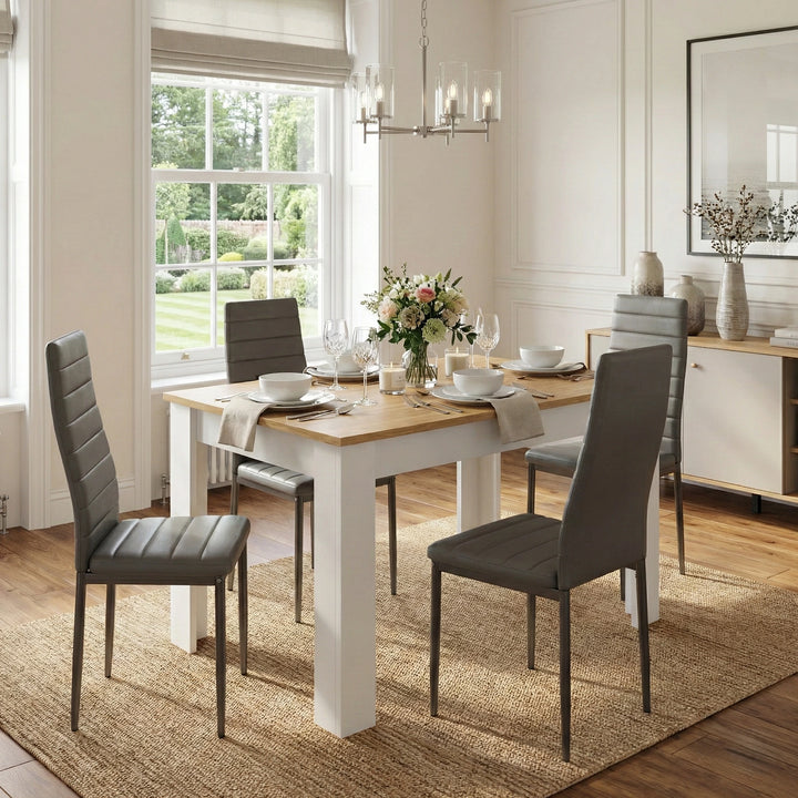 [4 Seater | Grey] Dining Table and Chairs Set with four grey ribbed chairs in a bright panelled dining room with garden view, chandelier, and flower centrepiece