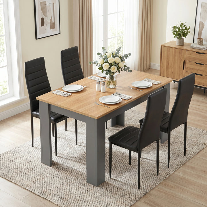 [4 Seater | Black] Grey & Pine 4-6 Seater Dining Table with four black chairs and a white rose centrepiece in a neutral dining room