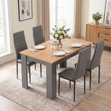 [4 Seater | Grey] Grey & Pine 4-6 seater dining table with four grey faux-leather chairs, shown from an angled view.