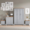 [Grey] 4 piece bedroom set styled against grey wall with gallery art and decor
