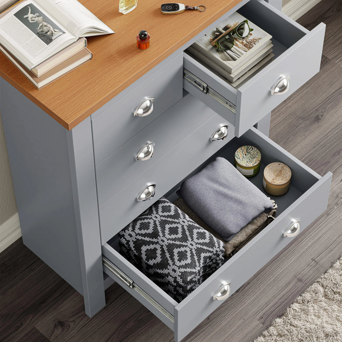 [Grey] 5 drawer chest open showing oak top surface with items and drawer depth