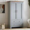 [Grey] Angled grey Shaker double wardrobe, oak top, panel doors and two cup-handle drawers next to art