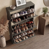  [Grey] Shaker Shoe Cabinet open showing tiered shelves holding multiple pairs of shoes across all three compartments with pampas vase and wooden console alongside