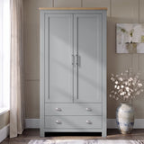[Grey] Two door wardrobe front view with oak top, lower drawers, slim handles, curtains, wall art, and ceramic vase