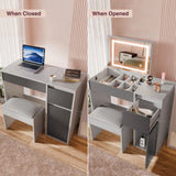 [Grey]  vanity table with closed and open compartments, featuring a laptop and mirror.