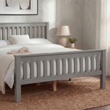 [Grey] wooden double bed frame grey paint, slatted ends, cream bedding and oak bedside lamp visible
