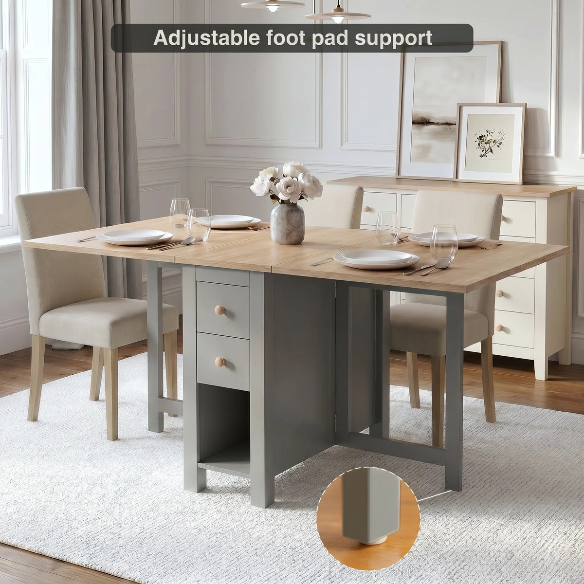 [150CM | Grey] Stovra Drop Leaf Dining Table extended with four upholstered chairs, adjustable foot pad detail inset, and a rose flower centrepiece