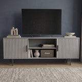 [Grey]  Front view of grey Flutrina 140cm TV unit, two ribbed doors closed and open centre showing books and Marshall speaker