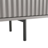 [Grey]  TV unit with slim metal legs and fluted doors, showing an elevated modern design for a living room.