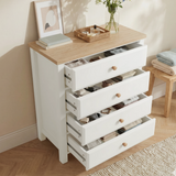 [White] Haven bedroom furniture set chest open at every level on white background with folded clothing