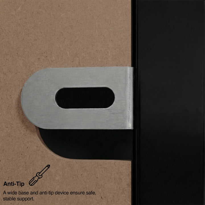 [Black] Haven chest of drawers anti-tip metal bracket close-up on black panel with safety caption beneath