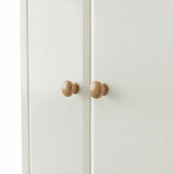 [White] Haven 2 door wardrobe knob detail, turned oak handles sitting centrally where the two white doors meet