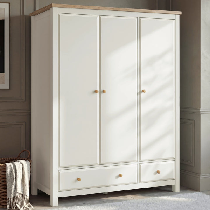 [White] Haven wardrobe front, three panelled doors, oak top, two base drawers with oak knob pulls