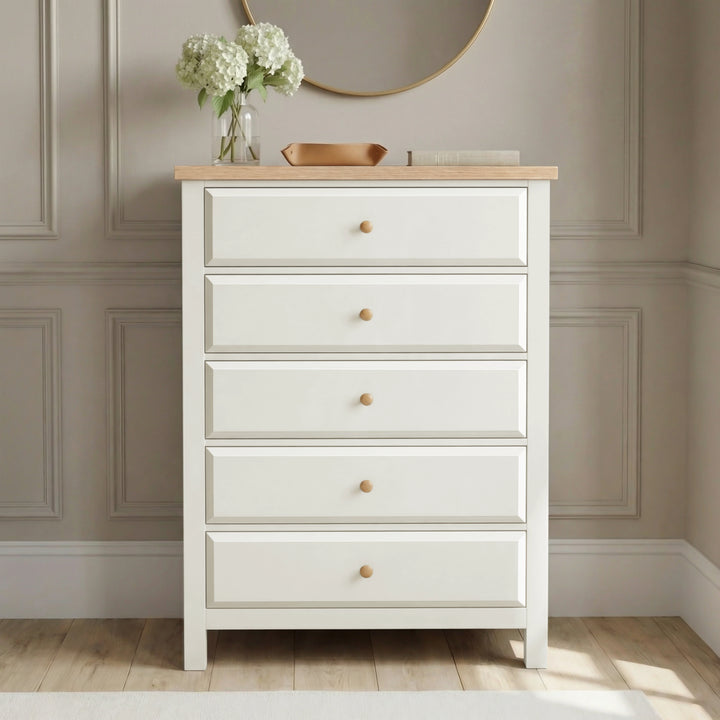 [White] Haven 5-drawer tall chest front view with decorative tray and small objects arranged on oak veneer top