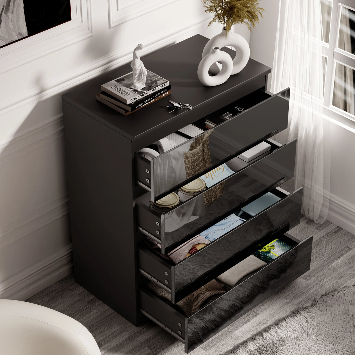 [Black] black gloss chest of 4 drawers fully open, demonstrating drawer depth and folded shirt storage capacity