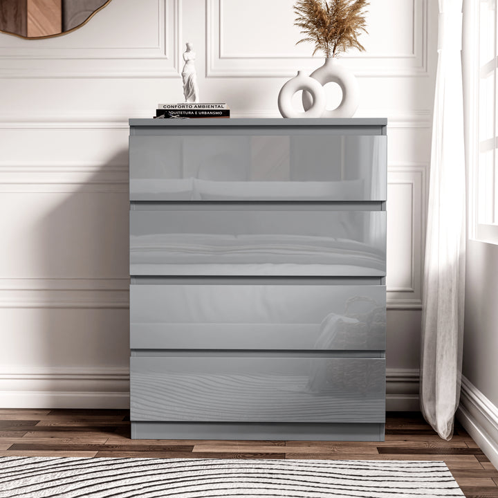 [Grey] 4 drawer chest in grey gloss finish, shown against white wainscot wall with figurine on top