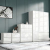 [White] high gloss 3 door wardrobe with 4 drawer chest and 2 drawer nightstand on shag rug, white finish