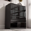[Black] Angled view of the black High Gloss 4 Drawer Chest of Drawers, gloss fronts reflecting window panes vertically.