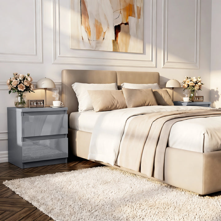 [Grey] Modern bedroom with beige bed, nightstands, and abstract art on the wall.
