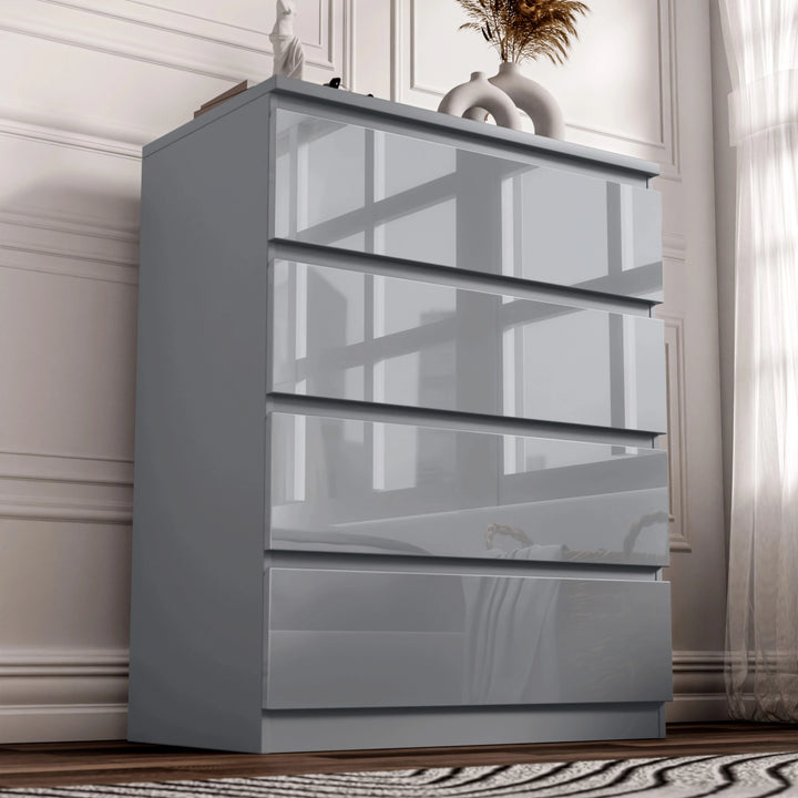 [Grey] Handleless grey High Gloss 4 Drawer Chest of Drawers angled inside a panelled bedroom setting.