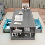 [Grey] Grey high gloss LED coffee table seen from above with side drawers open and books in shelves