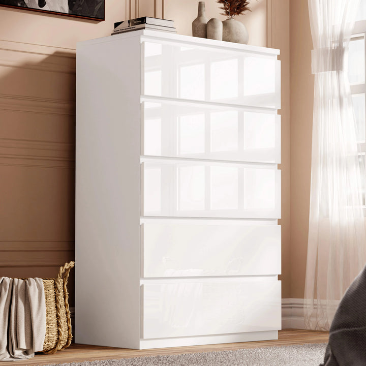 [White] High gloss tall chest of drawers in white beside cream curtain with books and decor on top