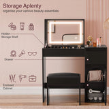 [Black] storage callout for black vanity showing hairdryer and handbag stowed in cabinet compartments