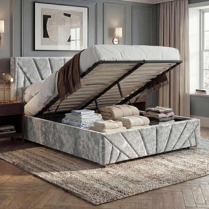 [King | Silver] Open ottoman storage showing raised slatted base, gas struts, and folded bedding inside