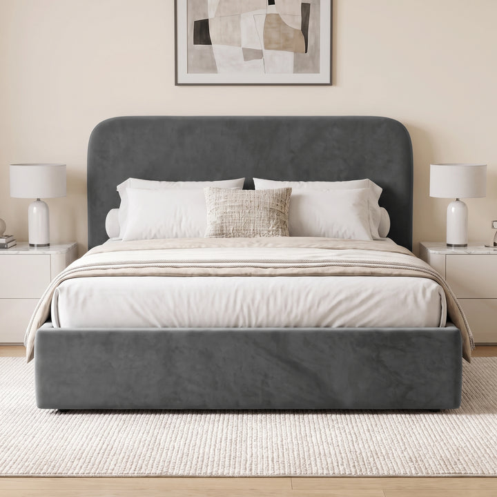 [King| Grey] upholstered lift-up storage bed with the mattress raised, showing neatly folded bedding and pillows in the open storage