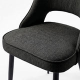 [Black | Tinted] Close-up of the 4 seater Kyvon black upholstered fabric comfy chair seat with black metal legs