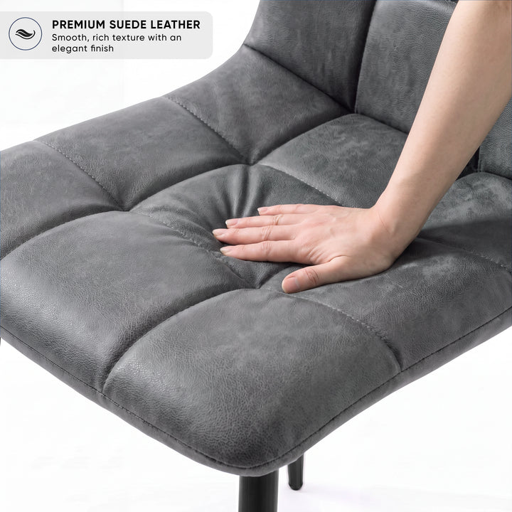 [Grey | Black Wood] Kyvon chair close-up: Premium Suede, padded grey suede tufted seat