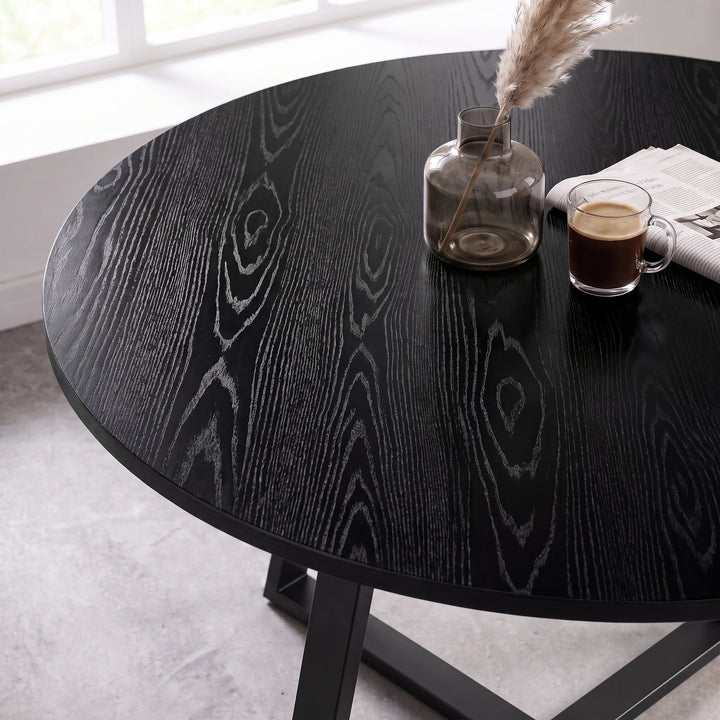 [Grey | Black Wood] Close-up of Kyvon round dining table set's black wood-effect tabletop and black base