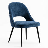 [Blue | Tinted] Kyvon blue upholstered fabric comfy dining chair angled view with black metal legs