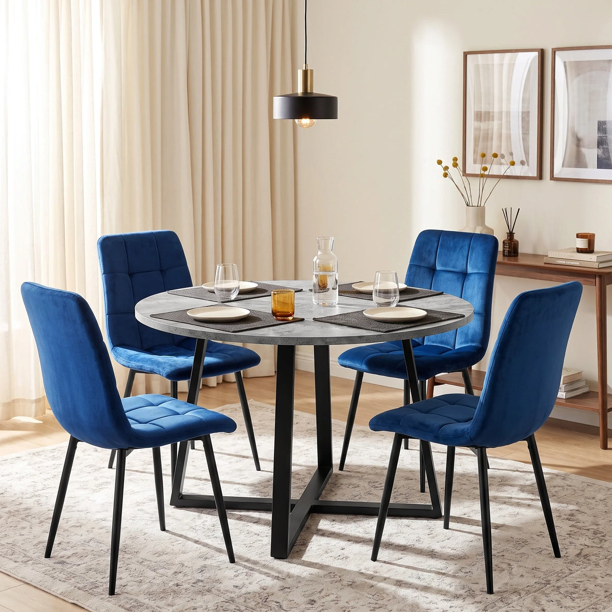 [Blue Velvet] Kyvon round dining table set with 4 blue velvet chairs in a dining room