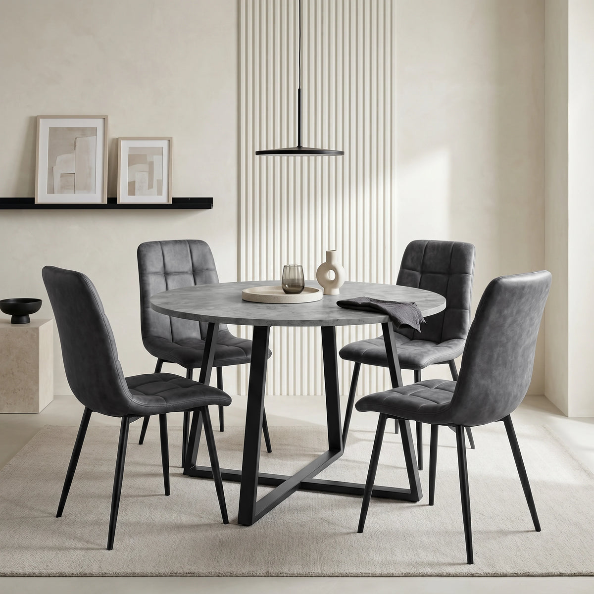 [Grey Suede] Kyvon round dining table set with 4 grey suede chairs in a styled room