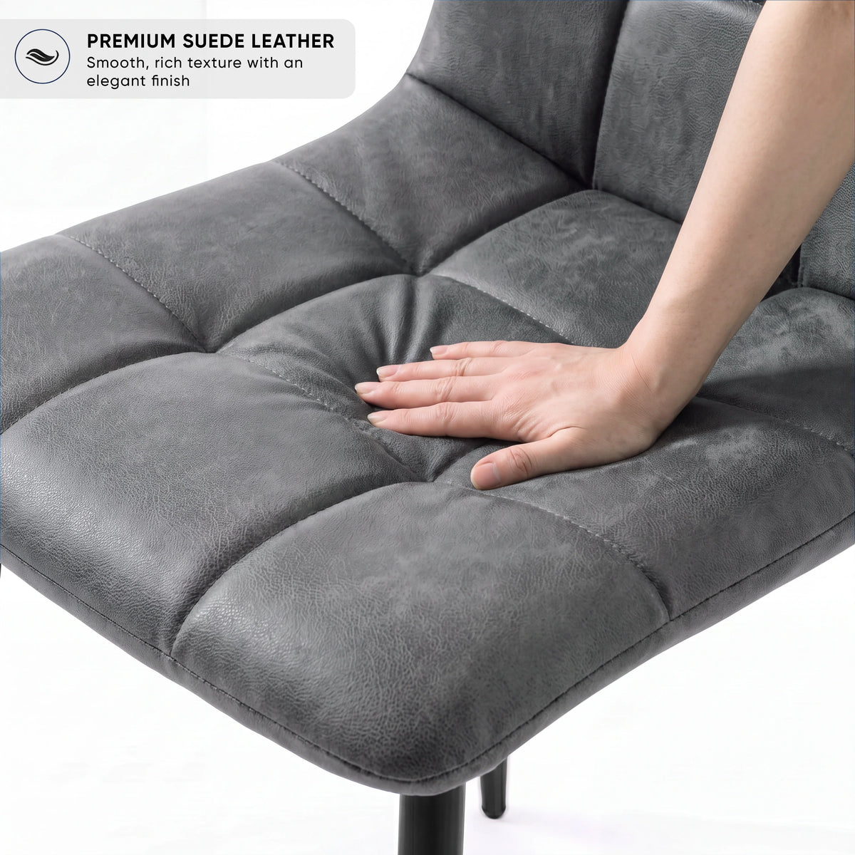 [Grey Suede] Kyvon chair close-up: Premium Suede, padded grey suede tufted seat